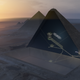 Khufu’s Pyramid 3D cut aerial view. The fuzzy white dots represent the location of the newly discovered void. (Image: ScanPyramids Mission)